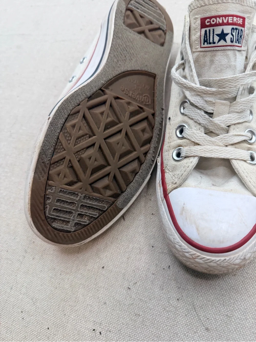 Converse White Low Top Sneakers with Red Trim